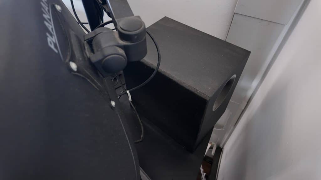 Logitech Subwoofer Behind Monitors on Desk